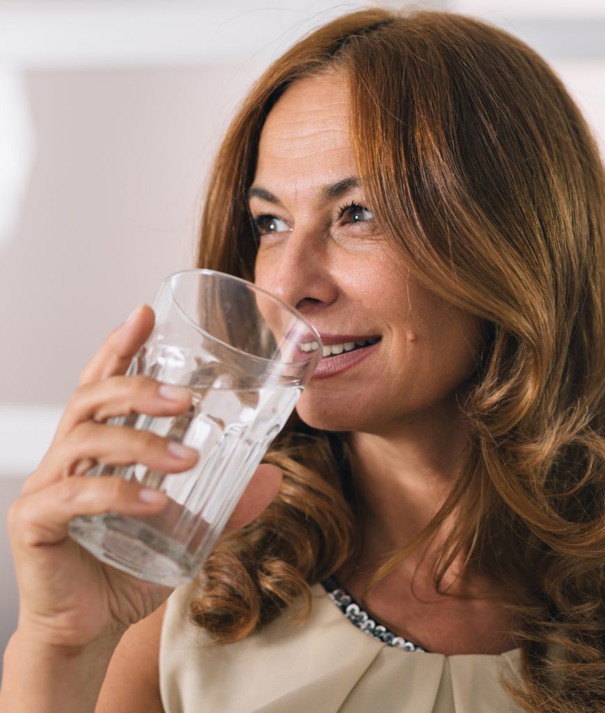 Woman drinking a glass of water