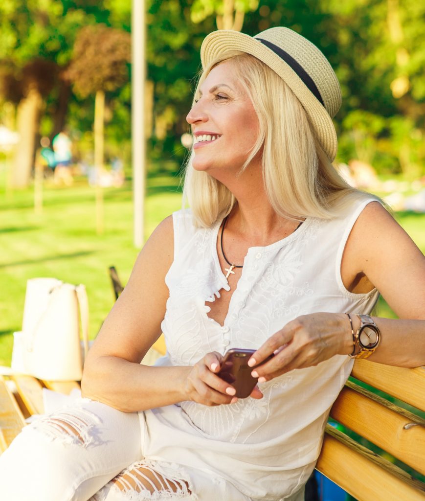 Woman sitting on a park bench